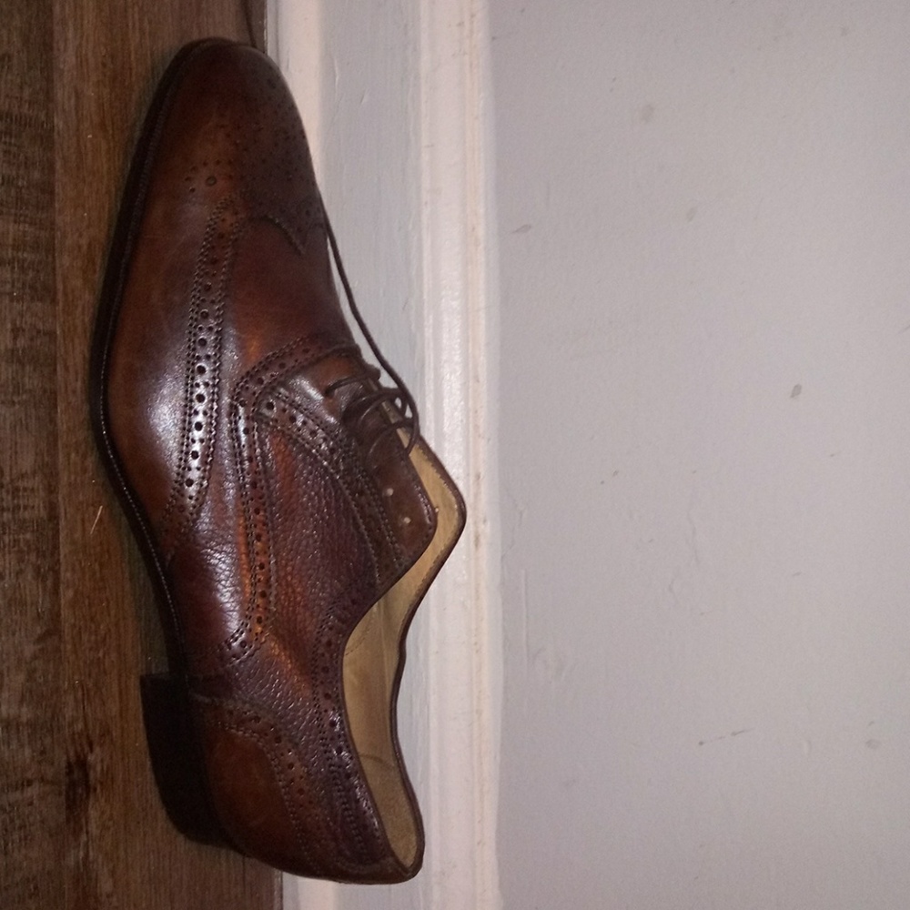 A brown leather men shoe